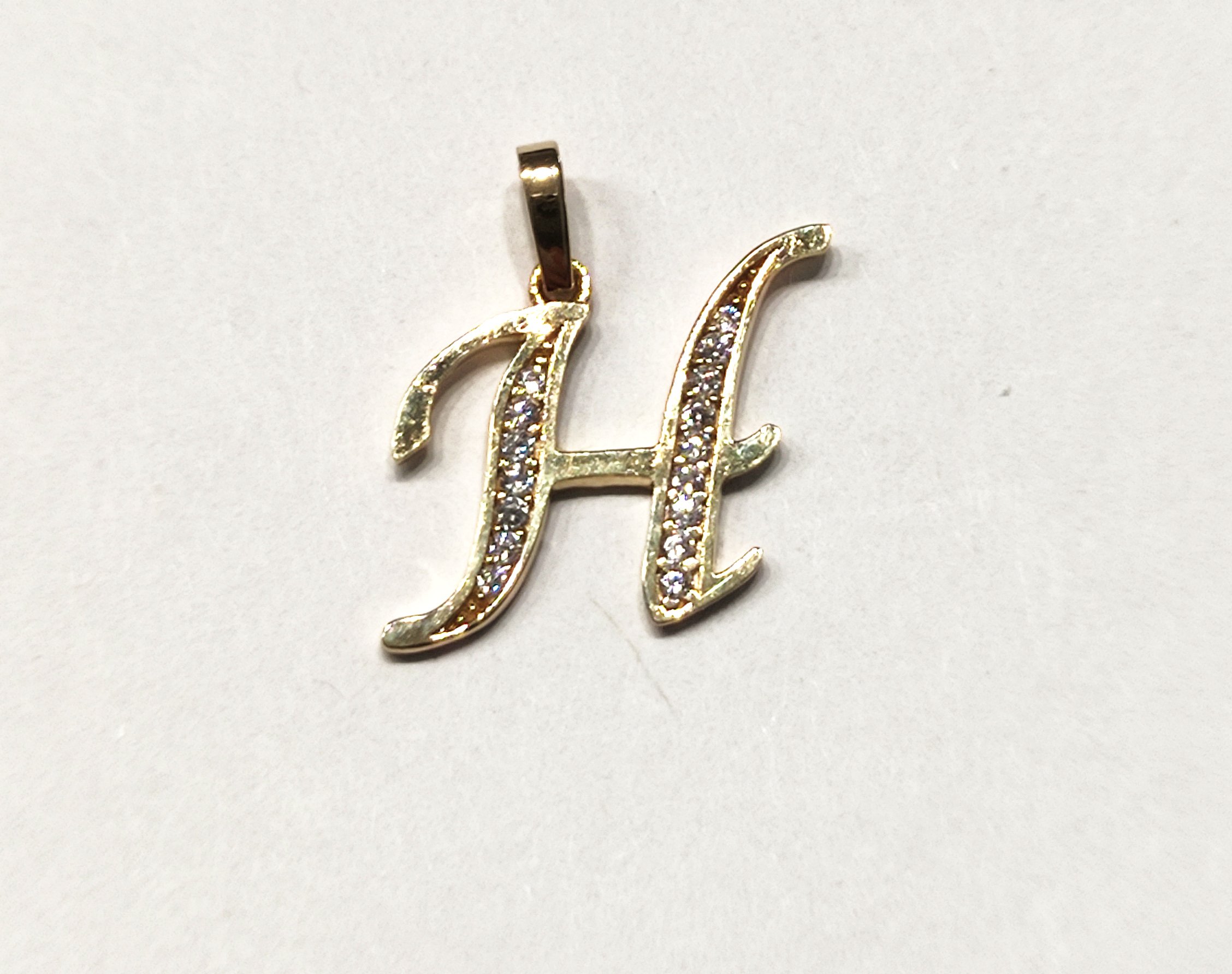 Zlaté písmenko H s kamínky